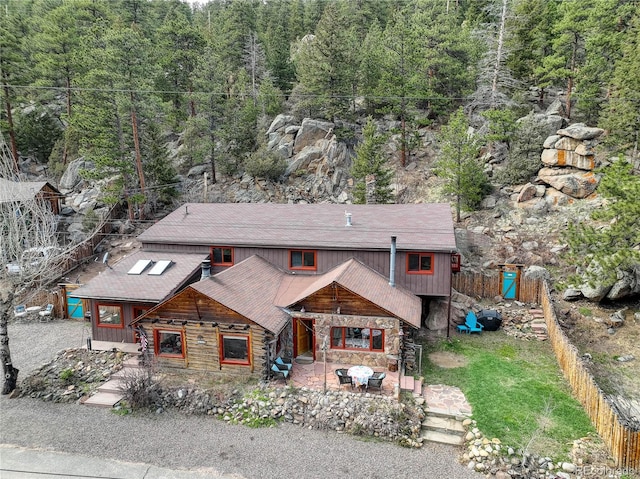 view of front of property with a patio