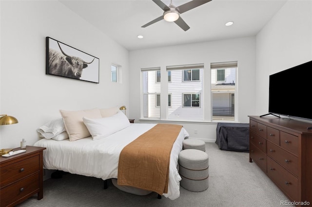 carpeted bedroom featuring ceiling fan