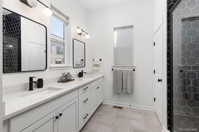 bathroom featuring tile patterned floors and vanity