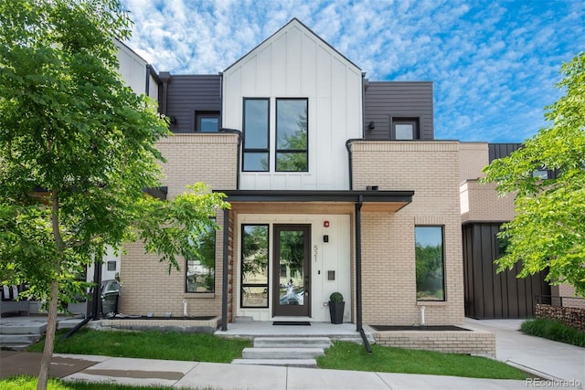 521 21st St, Golden, CO 80401 - modern home featuring board and batten siding and brick siding