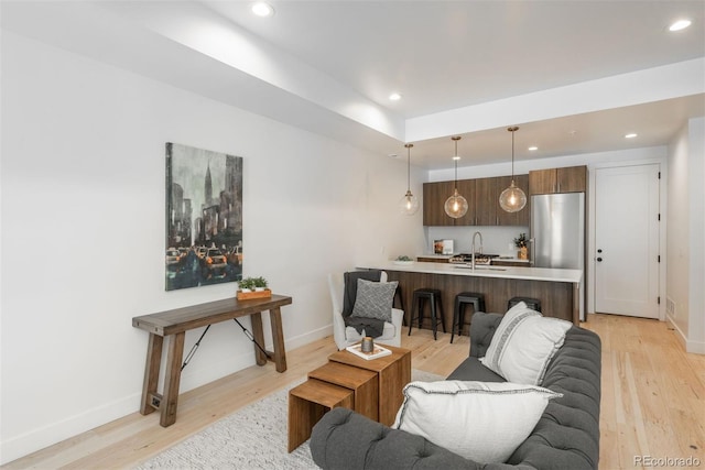 521 21st St, Golden, CO 80401 - living room with light wood finished floors and recessed lighting