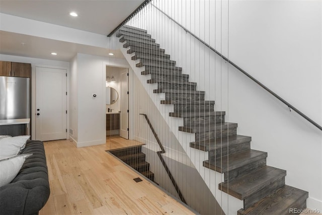 521 21st St, Golden, CO 80401 - stairway featuring wood finished floors and recessed lighting