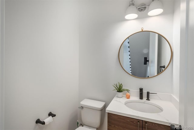 521 21st St, Golden, CO 80401 - half bathroom featuring vanity and toilet