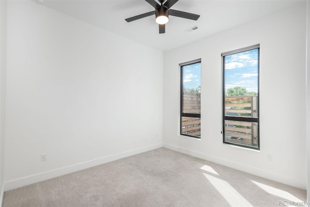 521 21st St, Golden, CO 80401 - empty room featuring light colored carpet and a ceiling fan