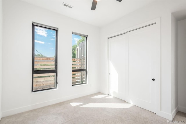 521 21st St, Golden, CO 80401 - unfurnished bedroom with carpet floors, a closet, and a ceiling fan