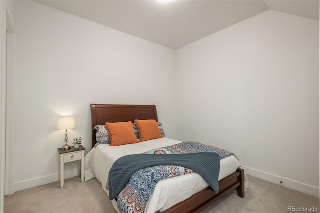 521 21st St, Golden, CO 80401 - carpeted bedroom featuring baseboards and vaulted ceiling