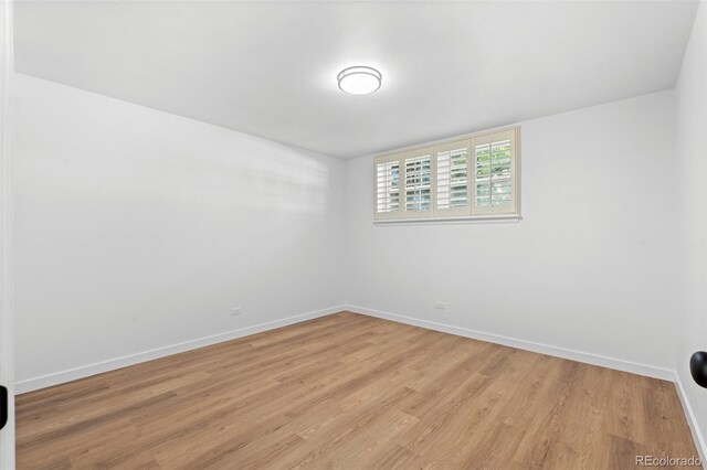 unfurnished room featuring light hardwood / wood-style flooring