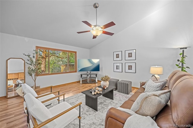 2226 Lily Dr, Loveland, CO 80537 - living area with a ceiling fan, wood finished floors, high vaulted ceiling, and baseboards