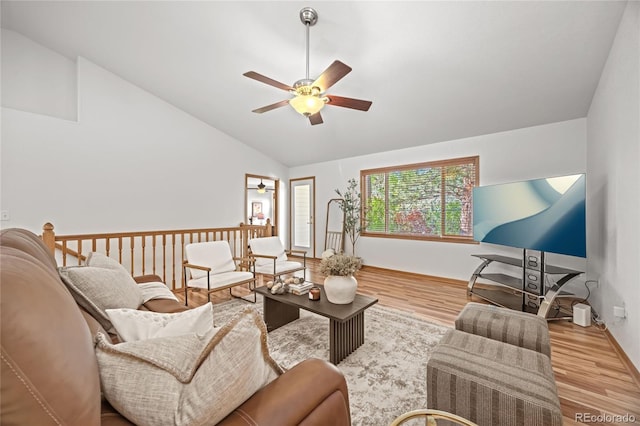 2226 Lily Dr, Loveland, CO 80537 - living area featuring ceiling fan, wood finished floors, high vaulted ceiling, and baseboards