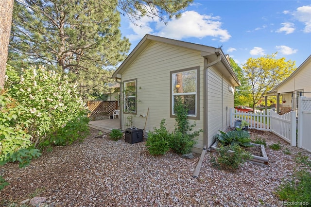 2226 Lily Dr, Loveland, CO 80537 - view of side of home featuring fence