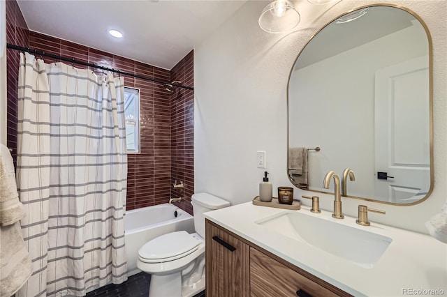 full bathroom featuring toilet, vanity, and shower / bath combo