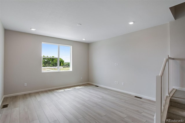 1418 Hudson Pl, Longmont, CO 80501 - spare room featuring light wood-style floors and recessed lighting
