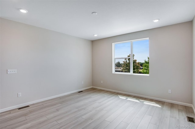 1418 Hudson Pl, Longmont, CO 80501 - empty room featuring light wood-type flooring and recessed lighting