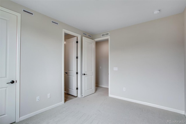 1418 Hudson Pl, Longmont, CO 80501 - unfurnished bedroom with baseboards and carpet floors