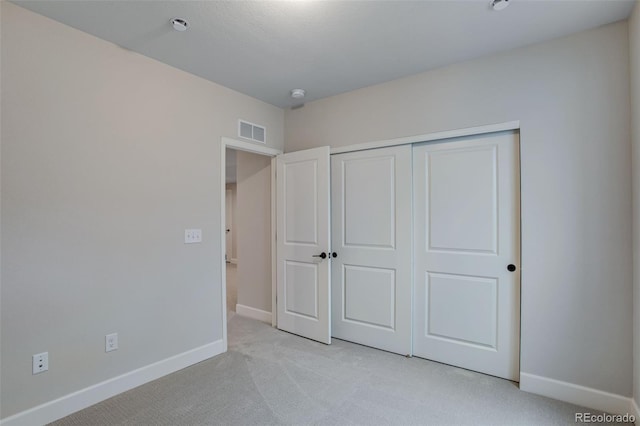 1418 Hudson Pl, Longmont, CO 80501 - unfurnished bedroom with light carpet and a closet