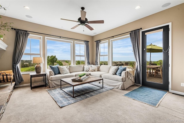6303 Ellingwood Point Pl, Castle Rock, CO 80108 - living area featuring carpet, a ceiling fan, and recessed lighting