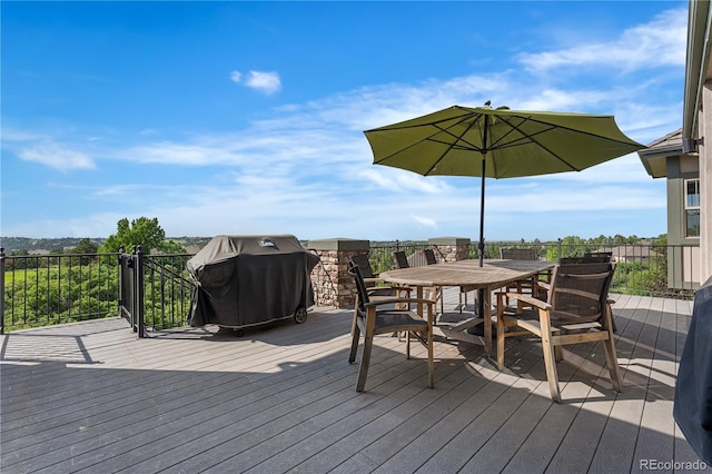 6303 Ellingwood Point Pl, Castle Rock, CO 80108 - deck with a grill and outdoor dining space