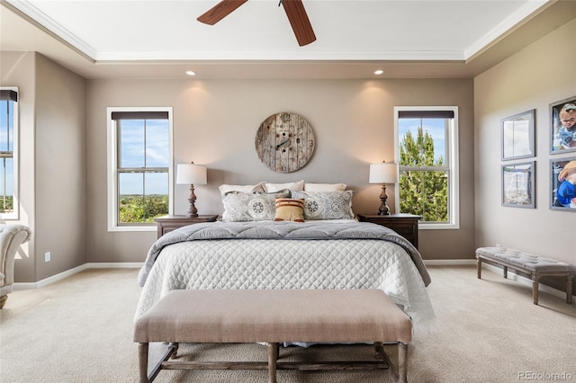 6303 Ellingwood Point Pl, Castle Rock, CO 80108 - bedroom with light carpet, recessed lighting, a tray ceiling, and ceiling fan