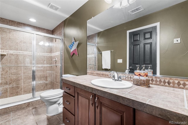 6303 Ellingwood Point Pl, Castle Rock, CO 80108 - full bath with vanity, a shower stall, and tile patterned flooring