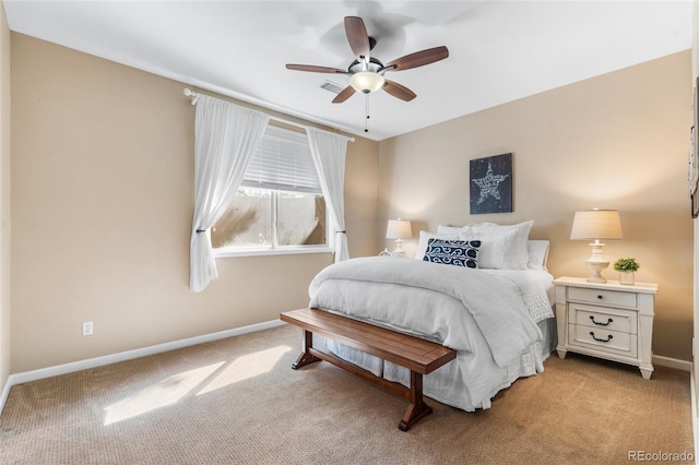 6303 Ellingwood Point Pl, Castle Rock, CO 80108 - bedroom with light colored carpet and ceiling fan