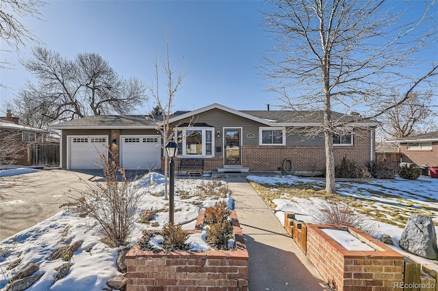 single story home with a garage