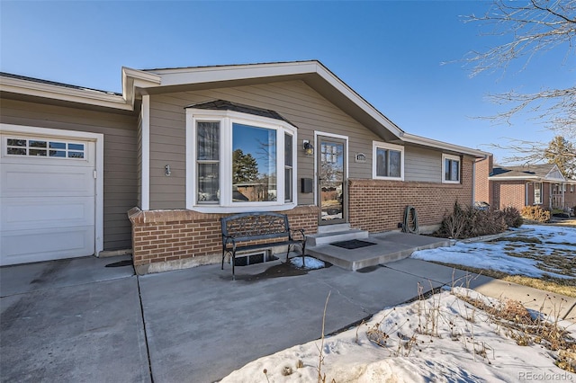 view of front of home with a garage