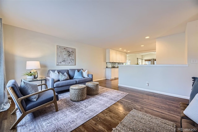 living room featuring dark hardwood / wood-style floors