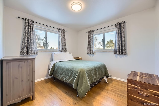 bedroom featuring light wood-type flooring