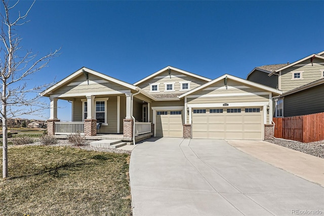 14521 Vancouver Pl, Parker, CO 80134 - craftsman house with a garage, a porch, fence, brick siding, and concrete driveway