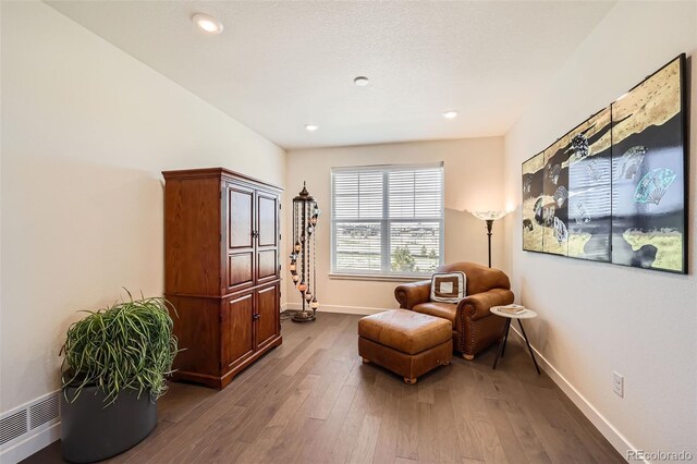 14521 Vancouver Pl, Parker, CO 80134 - living area with visible vents, stairway, recessed lighting, dark wood-style flooring, and baseboards