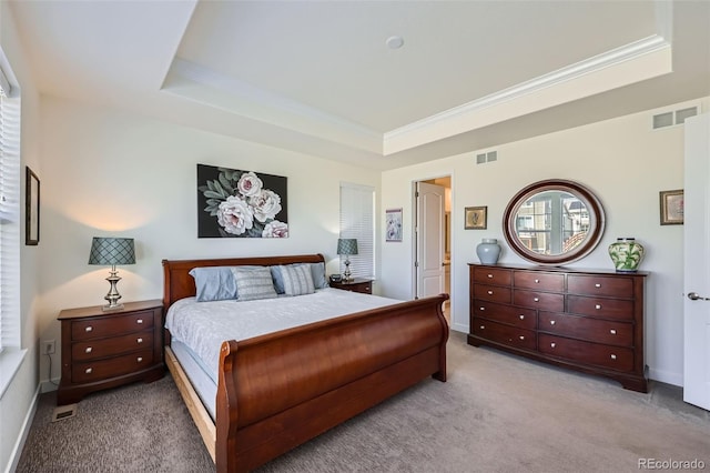 14521 Vancouver Pl, Parker, CO 80134 - carpeted bedroom with baseboards, visible vents, a tray ceiling, and ornamental molding