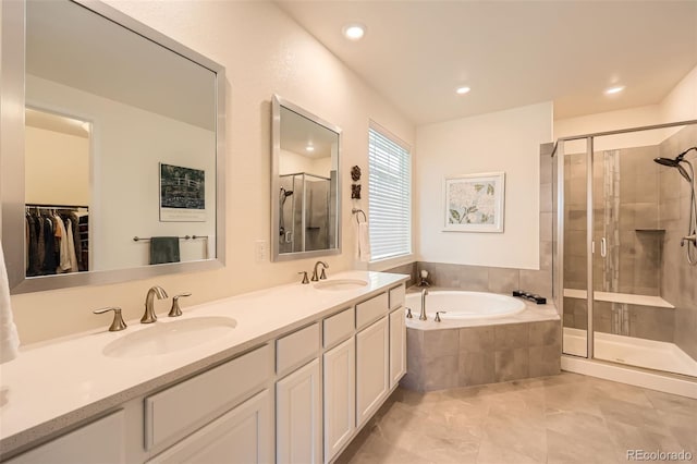 14521 Vancouver Pl, Parker, CO 80134 - bathroom with a sink, a stall shower, and a garden tub