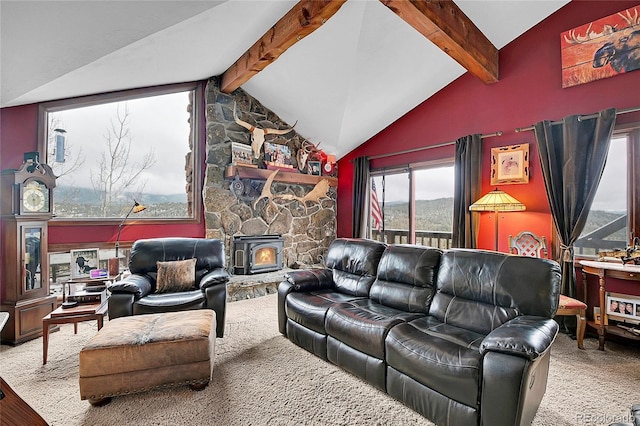 living room with lofted ceiling with beams and a wood stove