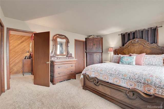 bedroom with light colored carpet