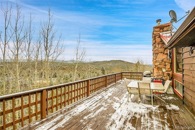 wooden terrace featuring a mountain view