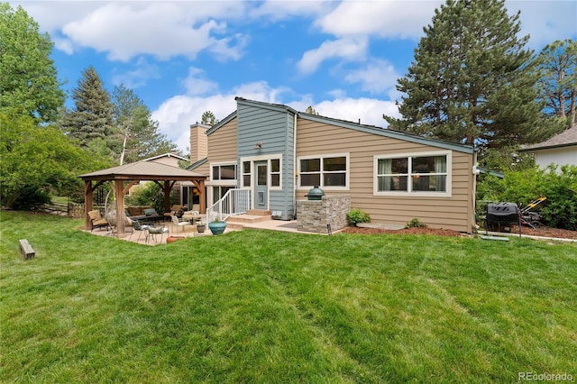 6621 E Peakview Pl, Centennial, CO 80111 - back of house with a gazebo, a patio, a lawn, and a chimney