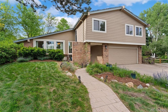 6621 E Peakview Pl, Centennial, CO 80111 - split level home with brick siding, an attached garage, driveway, and a front yard