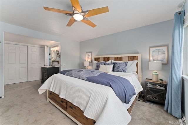 6621 E Peakview Pl, Centennial, CO 80111 - bedroom with light colored carpet, ceiling fan, and a closet