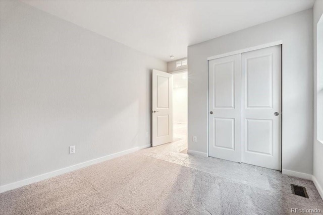 19019 E 94th Pl, Commerce City, CO 80022 - unfurnished bedroom with carpet floors, baseboards, and a closet