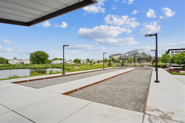 5142 N Quemoy Ct, Aurora, CO 80019 - view of property's community featuring a game area, a water view, and a residential view