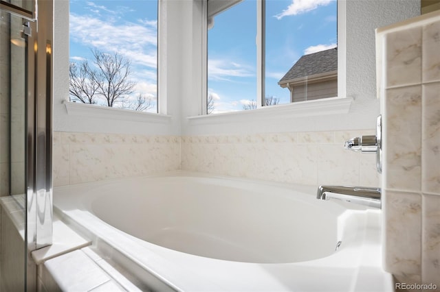 bathroom with a bath