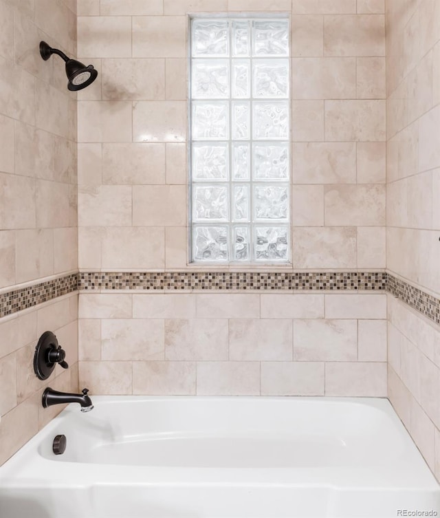 bathroom featuring bathing tub / shower combination