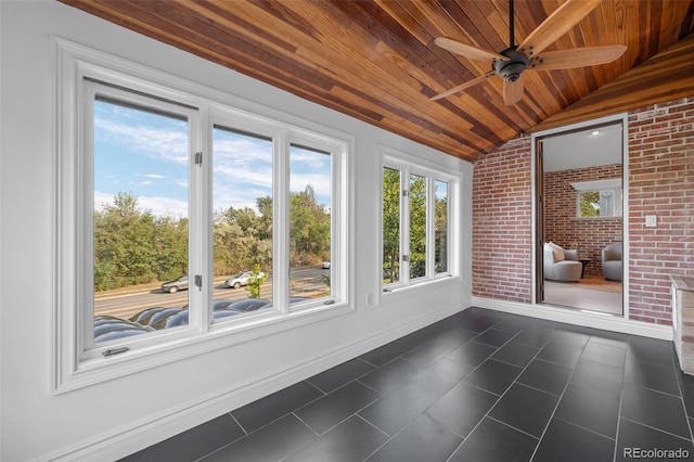 unfurnished sunroom with wooden ceiling, vaulted ceiling, and ceiling fan