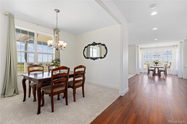 2490 Sagebrush St, Parker, CO 80138 - dining space featuring a chandelier, wood finished floors, and recessed lighting