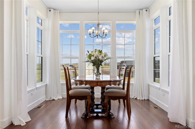 2490 Sagebrush St, Parker, CO 80138 - dining space with a chandelier and dark wood-style flooring