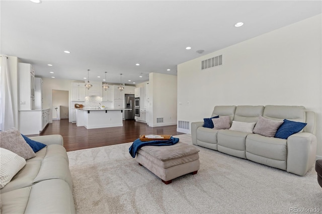 2490 Sagebrush St, Parker, CO 80138 - living area featuring recessed lighting and dark wood-style flooring