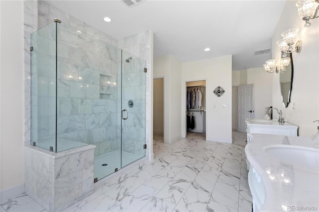 2490 Sagebrush St, Parker, CO 80138 - full bath with a chandelier, a shower stall, marble finish floors, a walk in closet, and recessed lighting