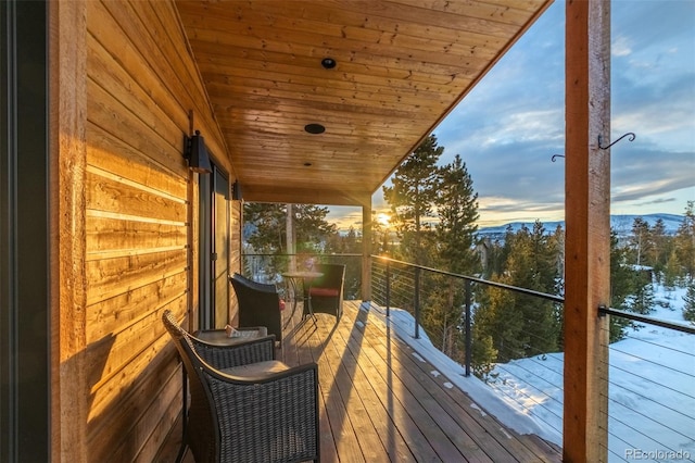 view of balcony at dusk