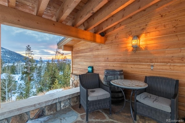 view of patio terrace at dusk