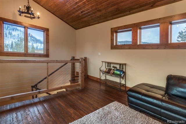 interior space featuring a notable chandelier, dark hardwood / wood-style floors, a healthy amount of sunlight, and wood ceiling